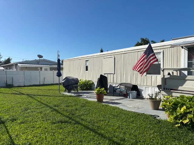 a view of a backyard with a garden