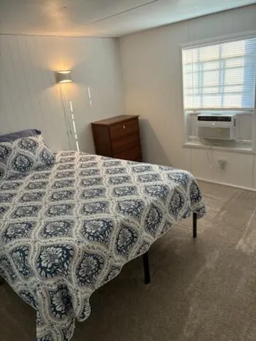 a bedroom with a bed