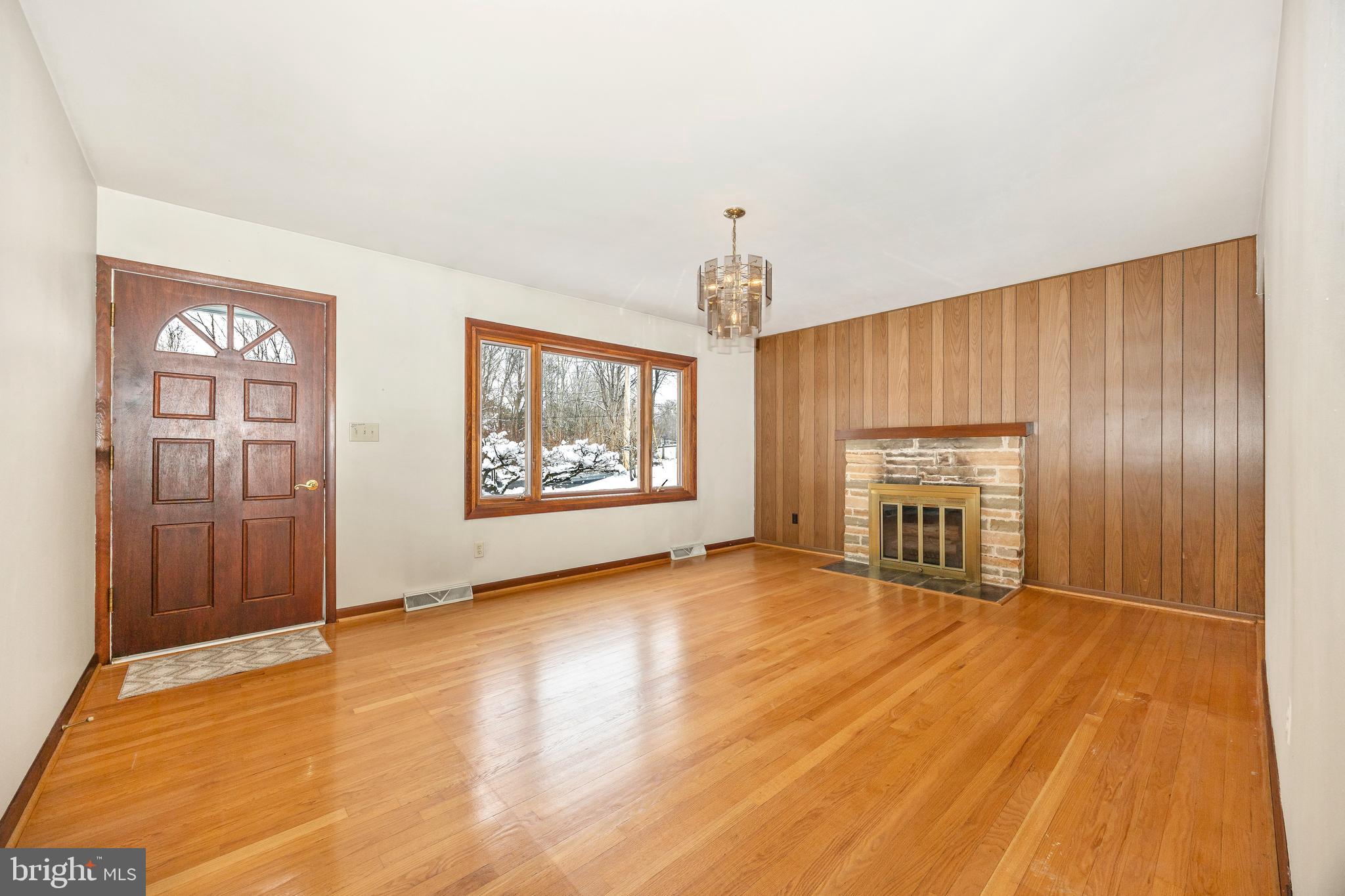 11511 Crickenberger Road New Market, MD 21774 - Photo 2 of 42 Front Entrance - Living Room with Wood Fireplace