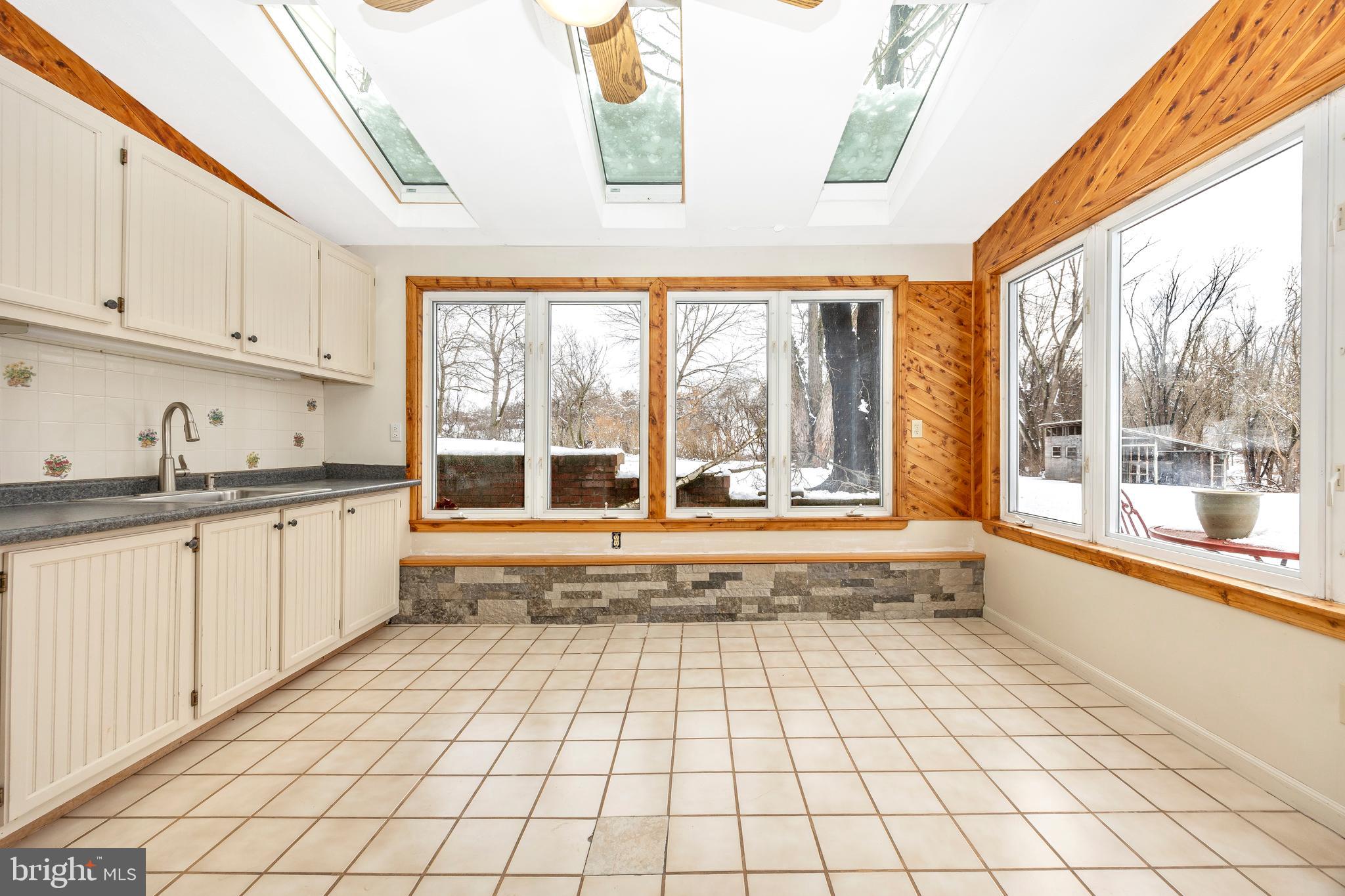 11511 Crickenberger Road New Market, MD 21774 - Photo 29 of 42 Lower Level Sunroom