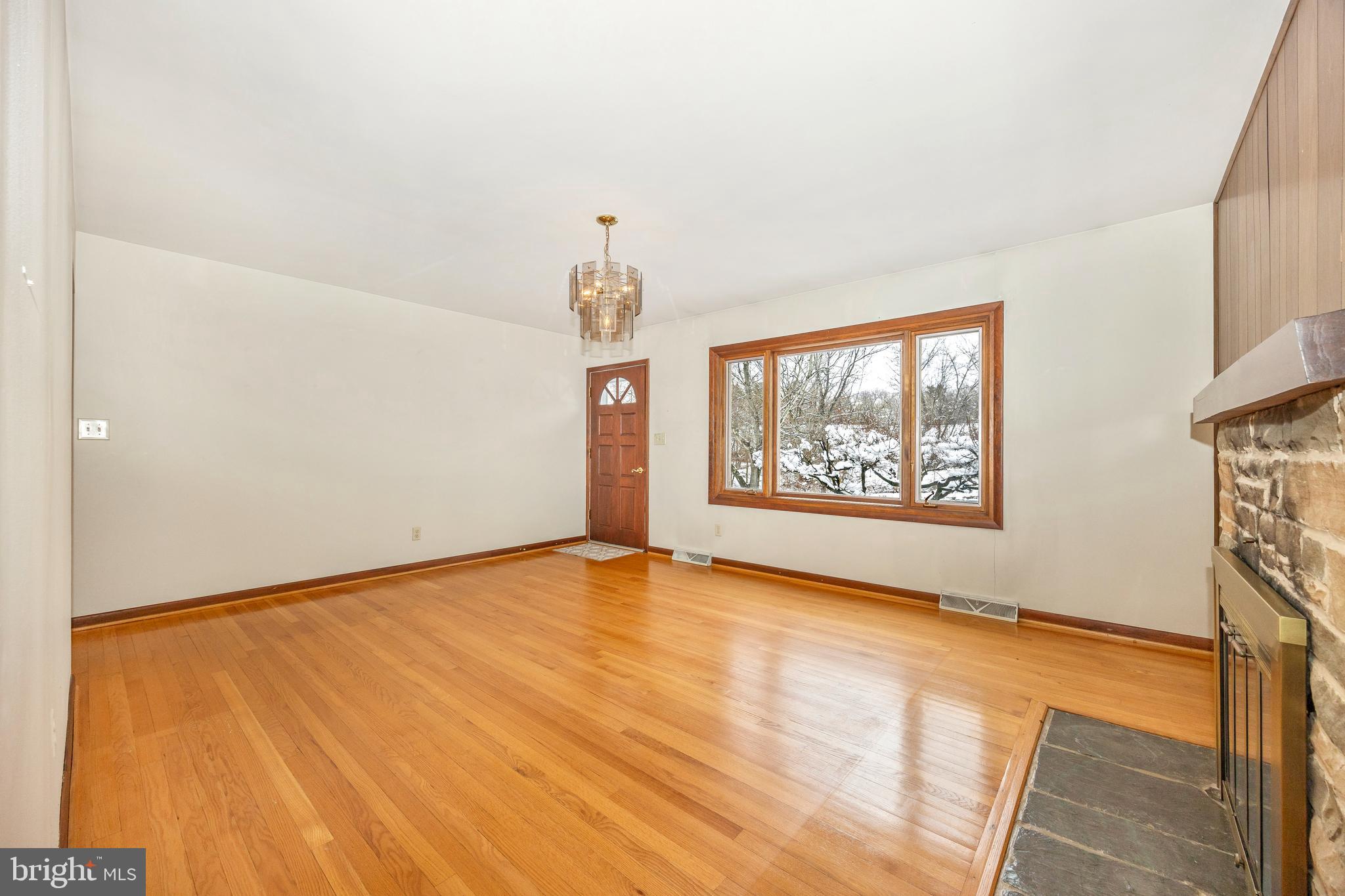 11511 Crickenberger Road New Market, MD 21774 - Photo 3 of 42 Front Entrance - Living Room with Wood Fireplace