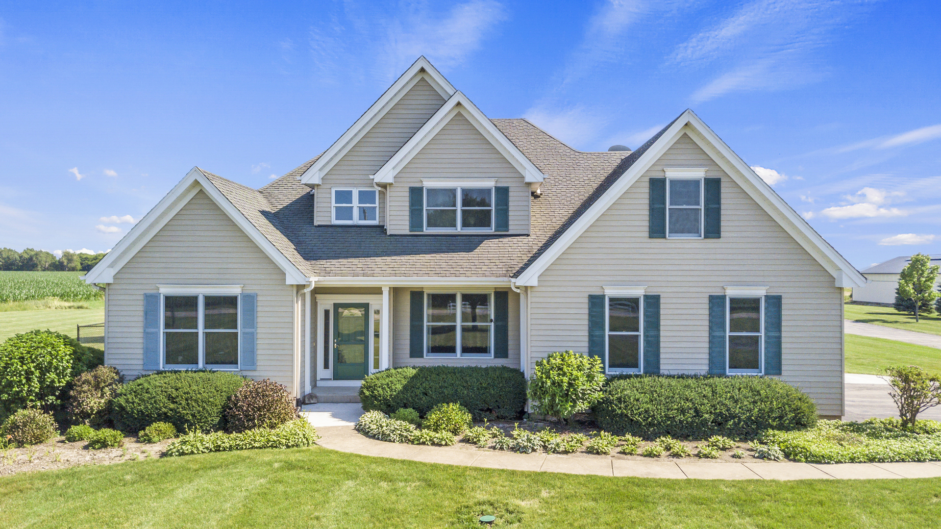 42W545 McDonald Road Elgin, IL 60124 - Photo 2 of 45 a front view of a house with a yard