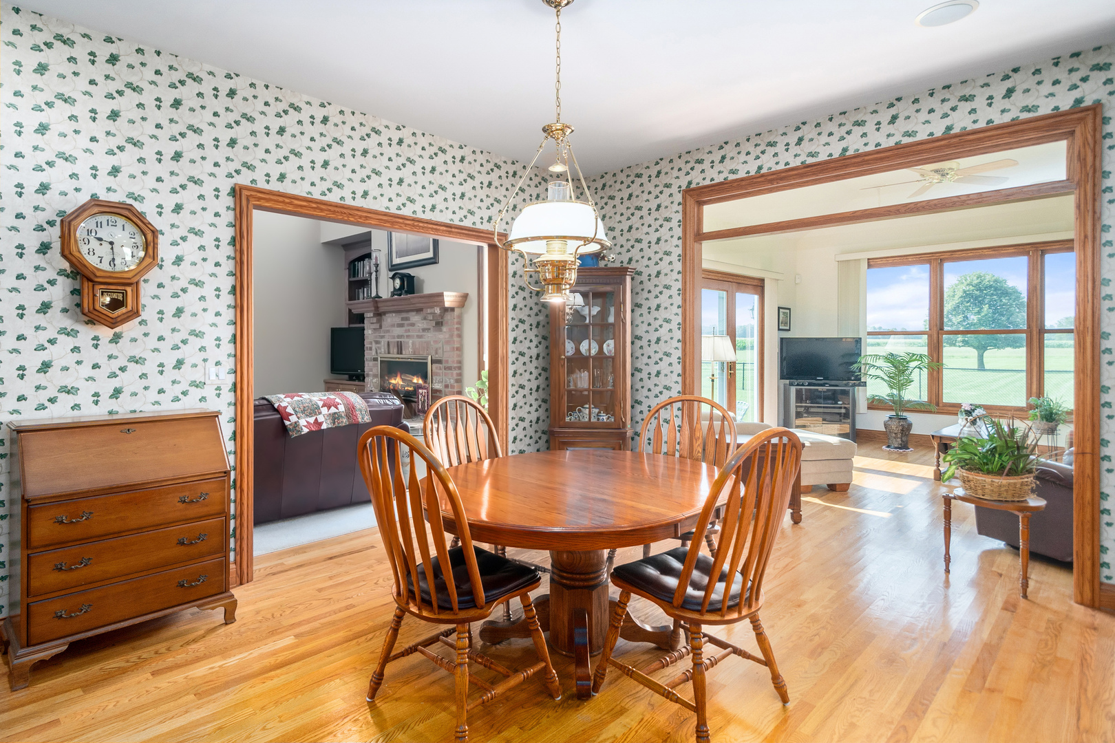 42W545 McDonald Road Elgin, IL 60124 - Photo 17 of 45 a dining room with furniture window wooden floor