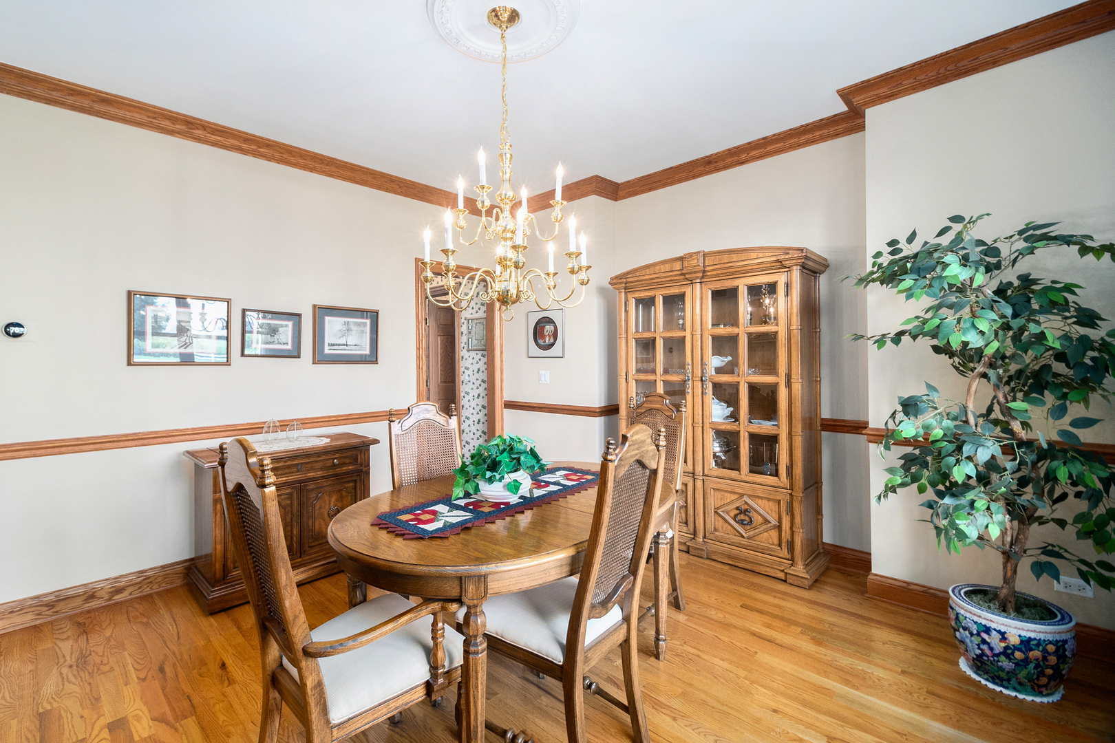 42W545 McDonald Road Elgin, IL 60124 - Photo 7 of 45 a view of a dining room with furniture and chandelier