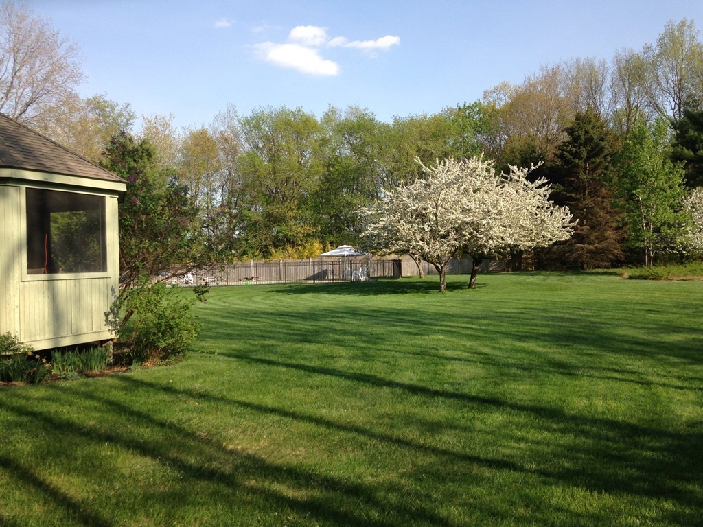 542 Sugar Road Bolton, MA 01740 - Photo 10 of 29 a view of a house with a yard