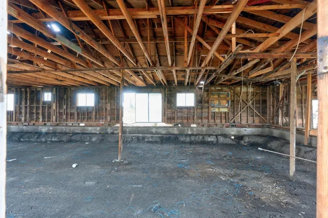 a view of backyard with wooden deck
