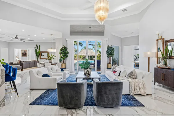 a kitchen with a table and chairs in it
