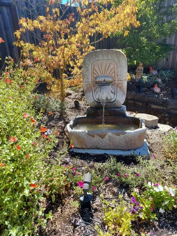 a view of a statue in a garden