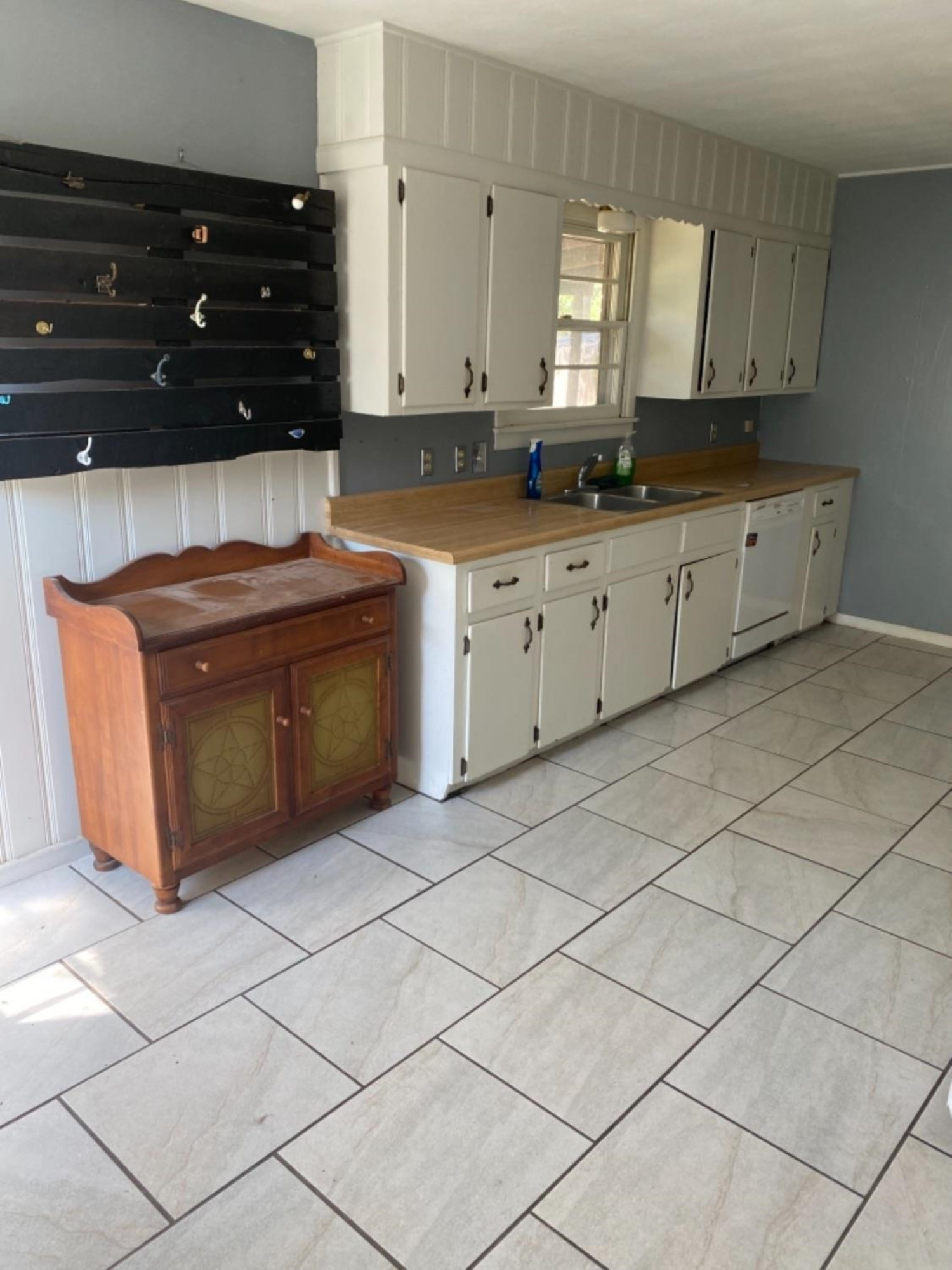 4604 28th Street Lubbock, TX 79410 - Photo 13 of 19 a kitchen with granite countertop a sink and a stove