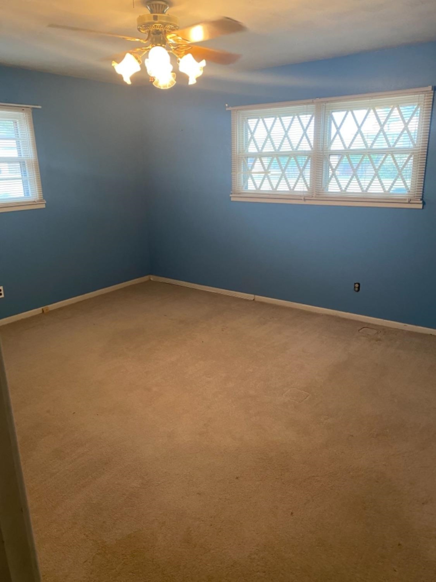 4604 28th Street Lubbock, TX 79410 - Photo 5 of 19 an empty room with windows