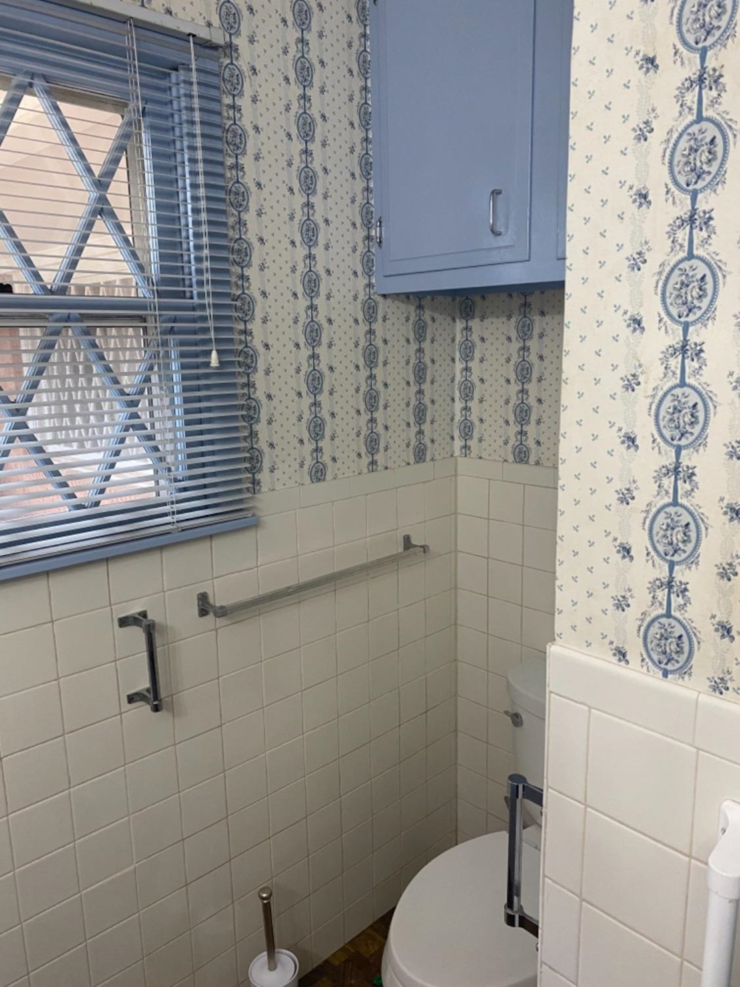4604 28th Street Lubbock, TX 79410 - Photo 6 of 19 a bathroom with a toilet sink and window