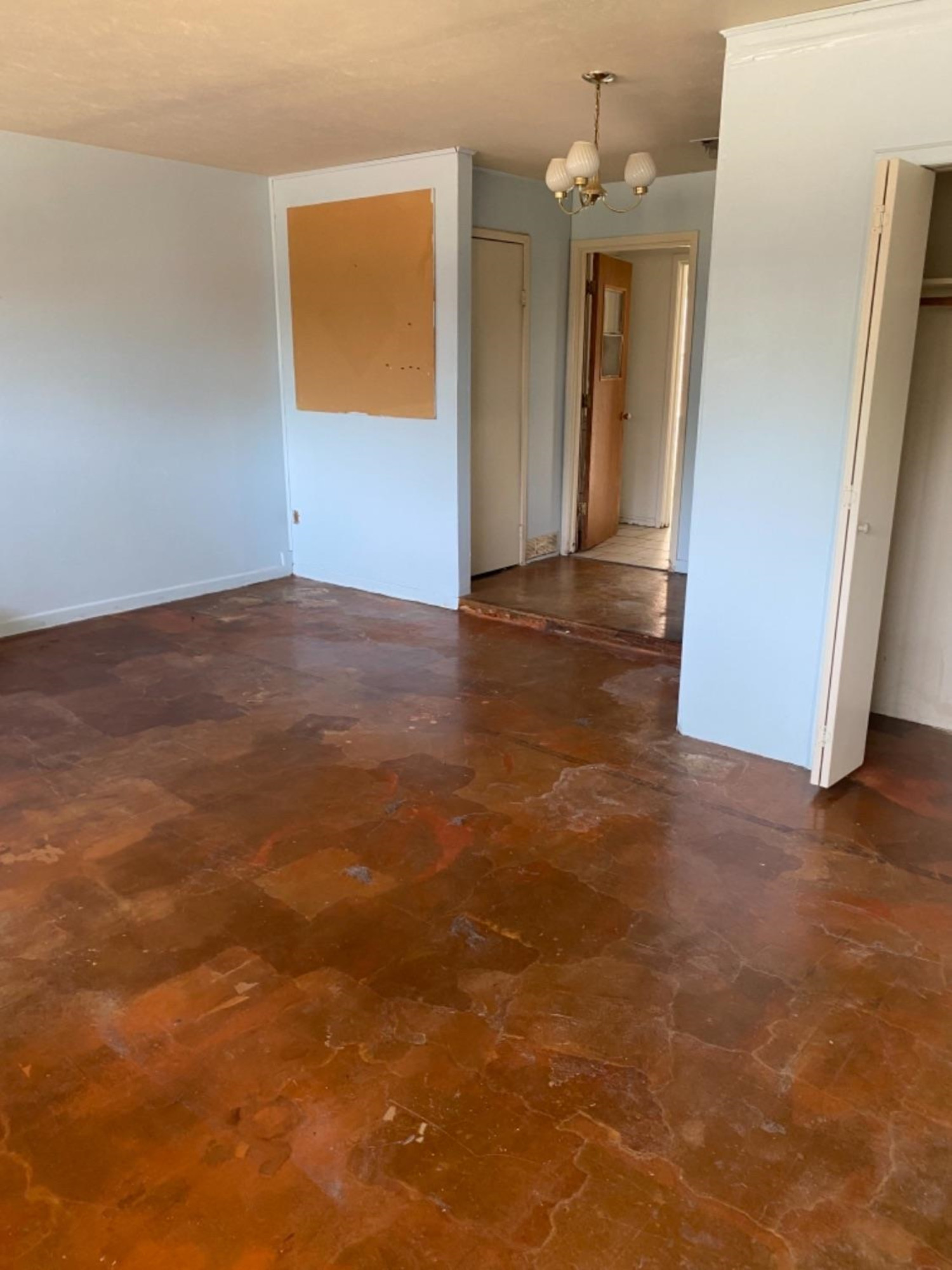 4604 28th Street Lubbock, TX 79410 - Photo 10 of 19 an empty room with wooden floor and windows