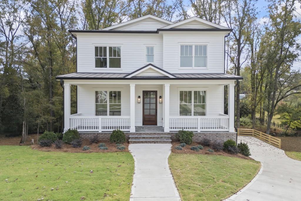 611 Foster Park Lane Madison, GA 30650 - Photo 1 of 54 front view of a house with a yard