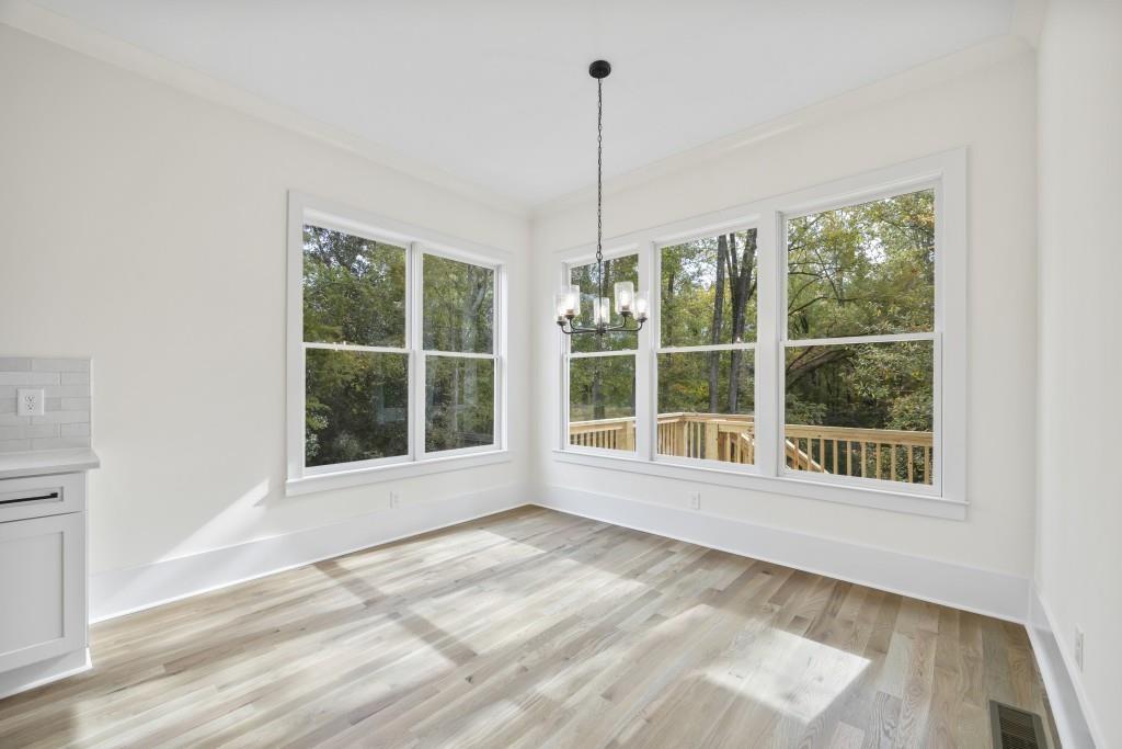 611 Foster Park Lane Madison, GA 30650 - Photo 22 of 54 a view of an empty room with a window