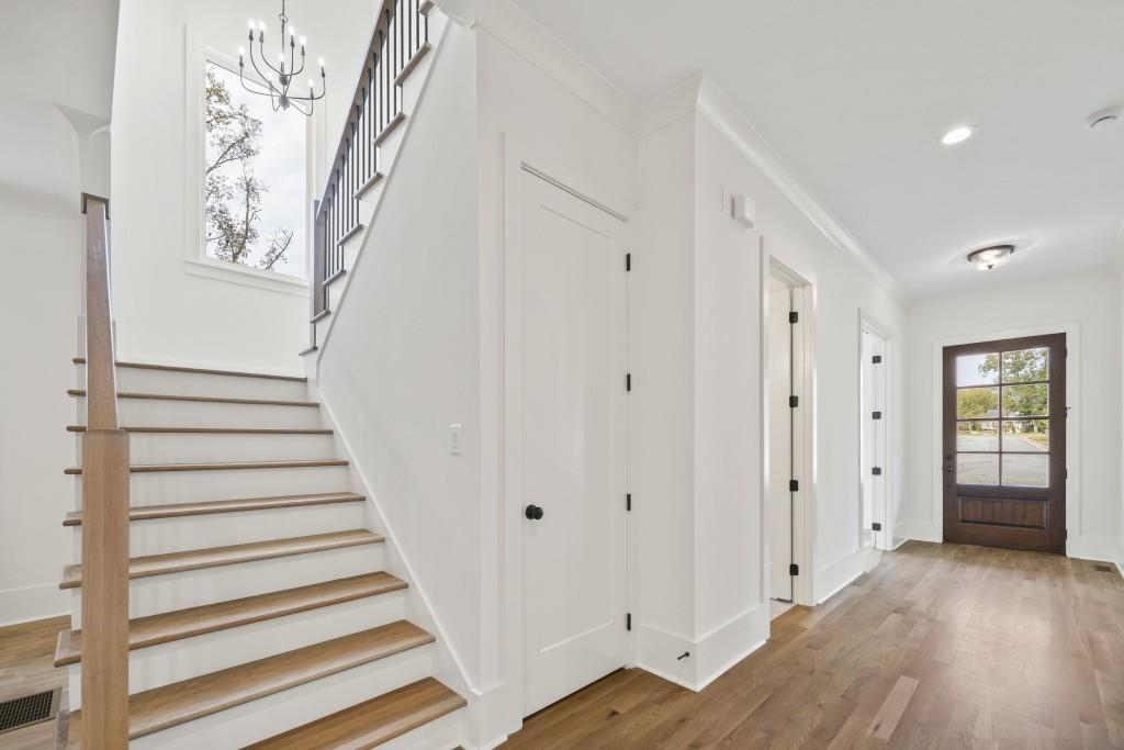 611 Foster Park Lane Madison, GA 30650 - Photo 24 of 54 a view of a hallway with wooden floor and entryway