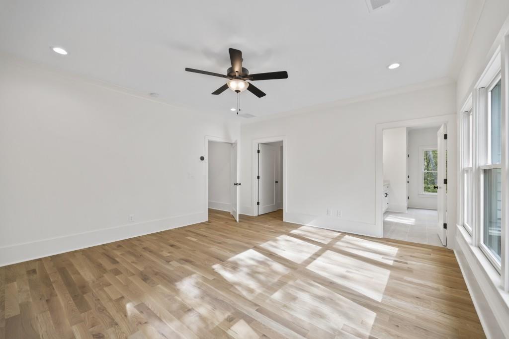 611 Foster Park Lane Madison, GA 30650 - Photo 27 of 54 a view of a room with a ceiling fan closet and a window