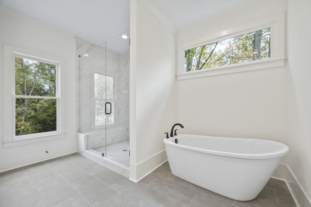 611 Foster Park Lane Madison, GA 30650 - Photo 31 of 54 a white bath tub sitting next to a window
