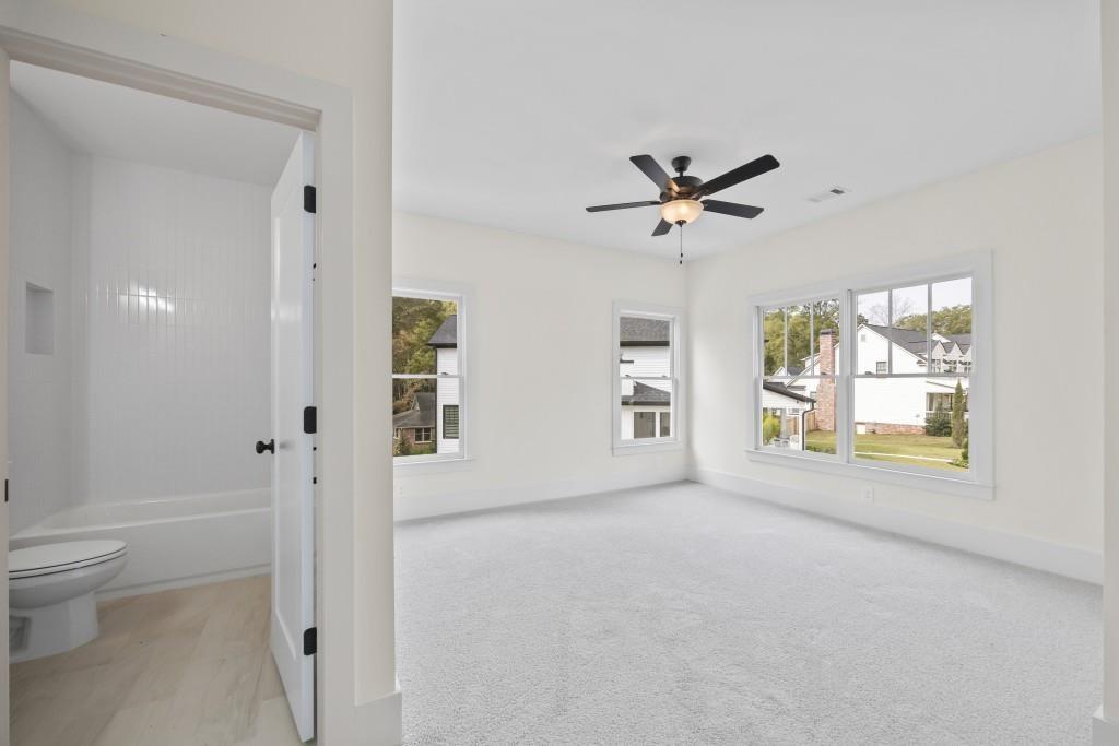 611 Foster Park Lane Madison, GA 30650 - Photo 35 of 54 a view of an empty room with a window