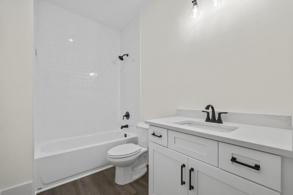 611 Foster Park Lane Madison, GA 30650 - Photo 46 of 54 a bathroom with a sink a toilet and shower