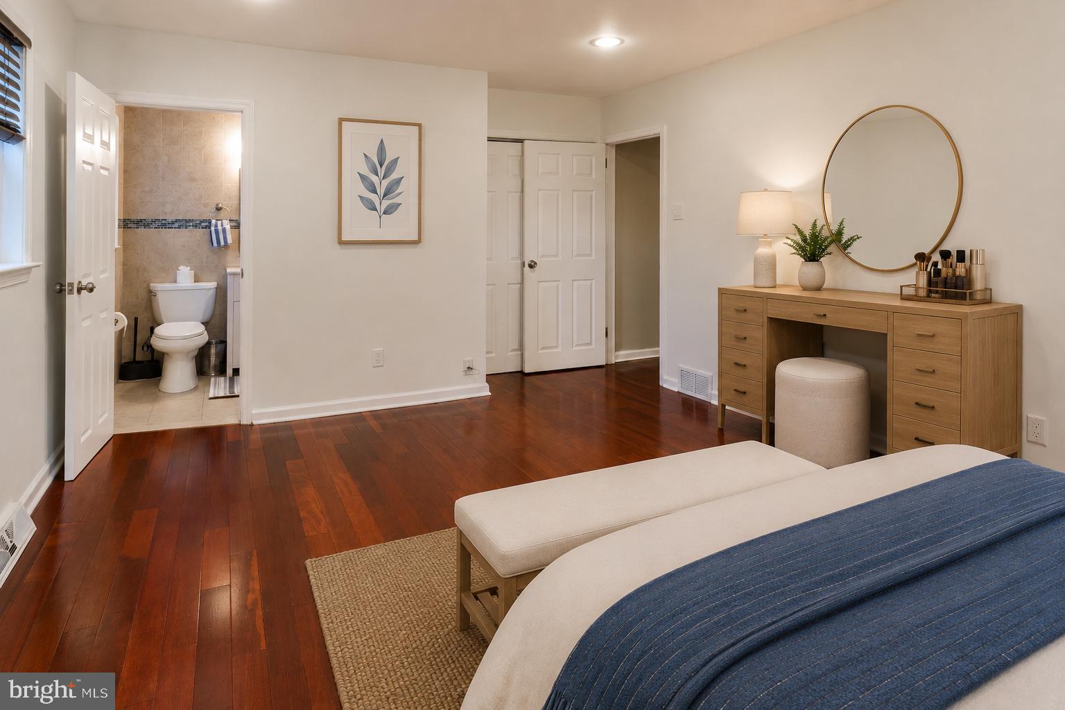 1588 Williams Road Abington, PA 19001 - Photo 18 of 34 a bedroom with a bed and a chandelier