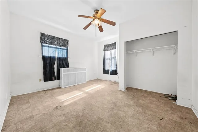 an empty room with windows