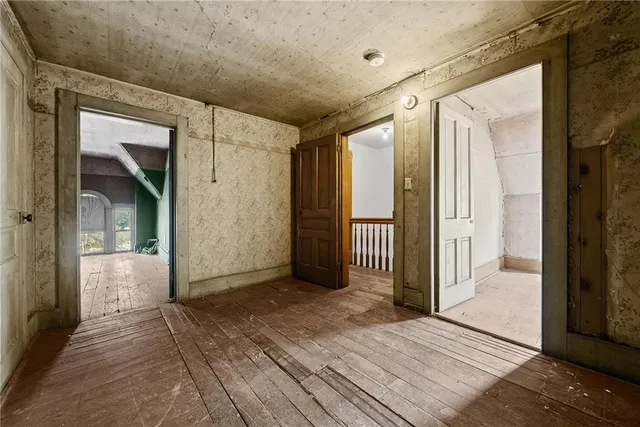 a view of an empty room with a garage