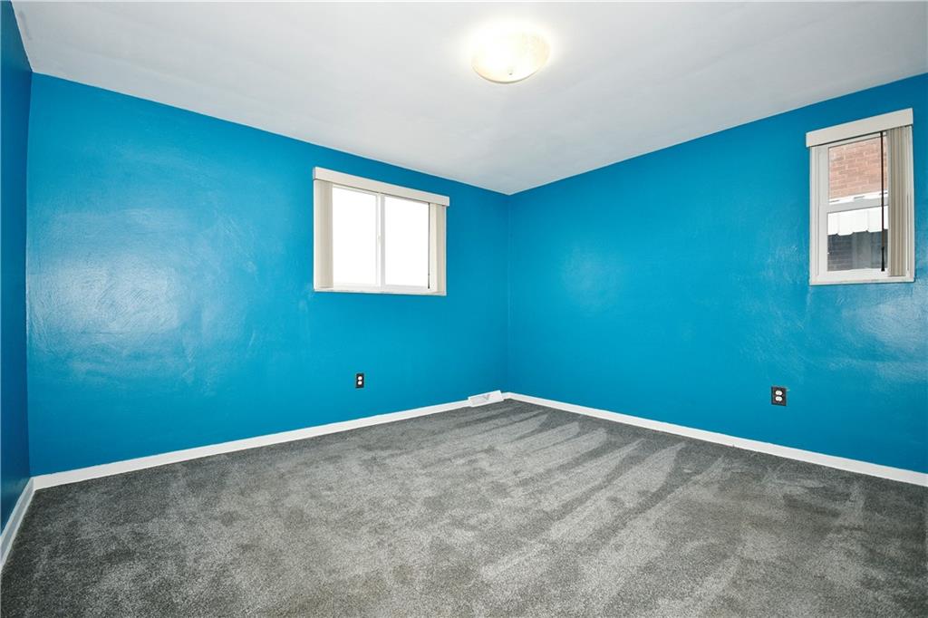 416 Pearce Road Pittsburgh, PA 15234 - Photo 17 of 32 an empty room with windows
