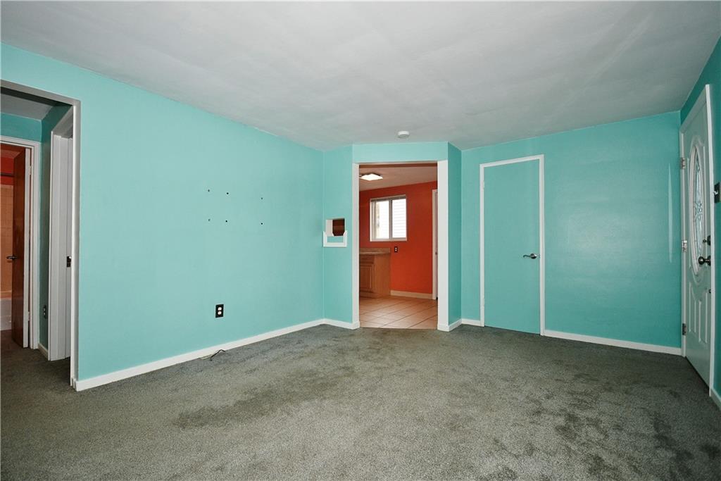 416 Pearce Road Pittsburgh, PA 15234 - Photo 7 of 32 an empty room with closet and mirror