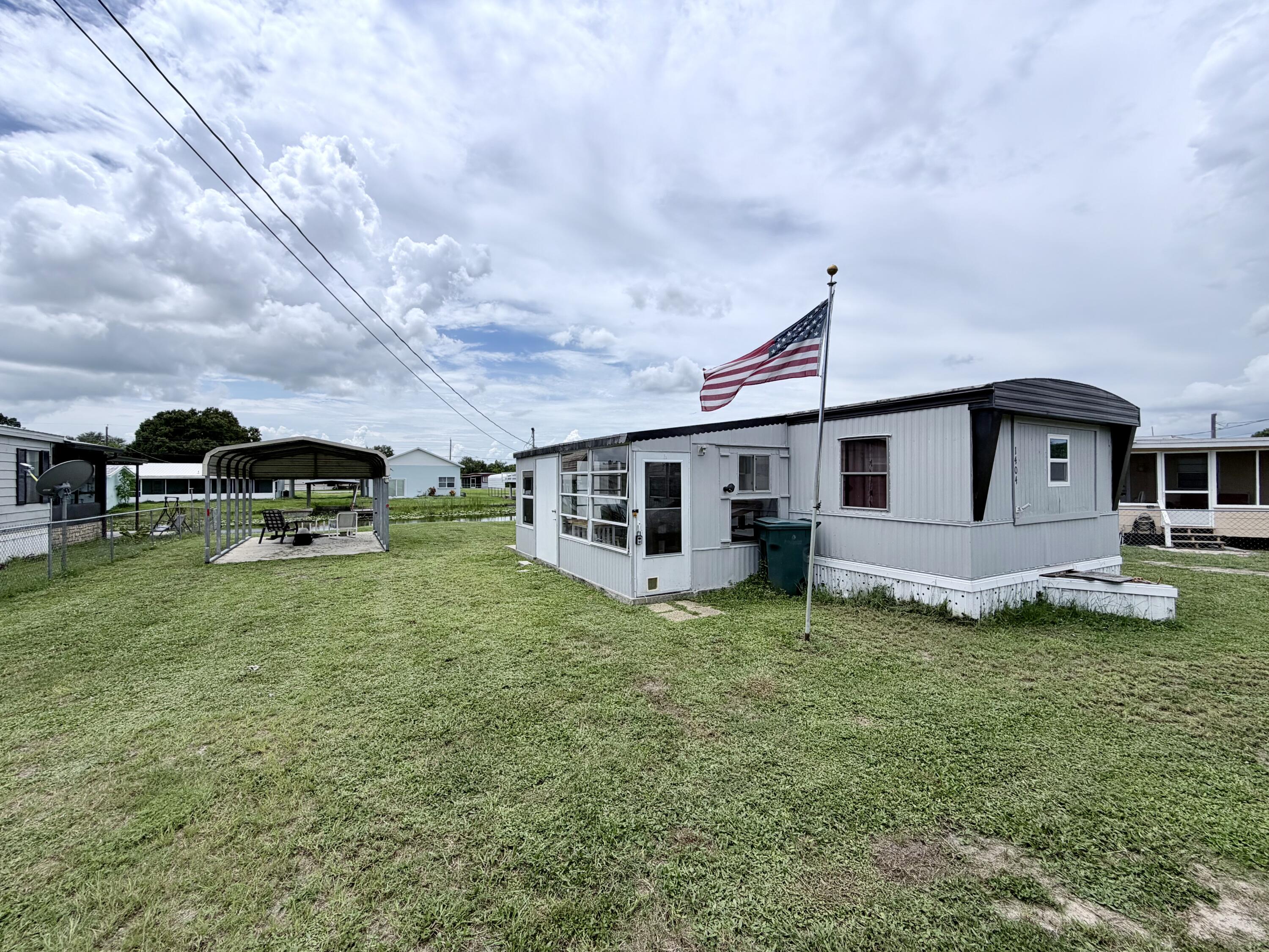 1404 Hunter Road Okeechobee, FL 34974 - Photo 1 of 21 IMG_8781