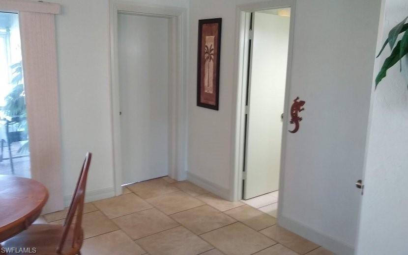 7659 Laurel Valley Road Fort Myers, FL 33967 - Photo 13 of 35 a view of a hallway with seating area