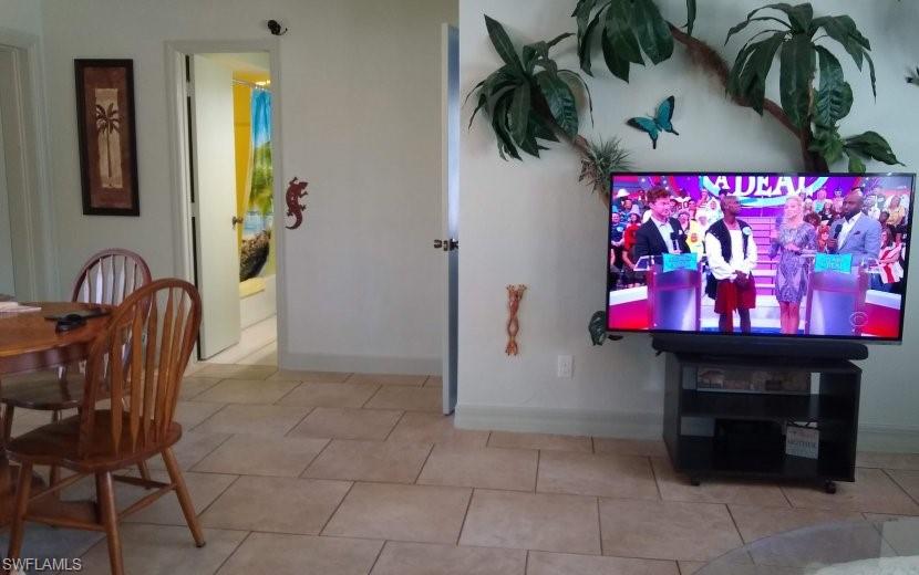 7659 Laurel Valley Road Fort Myers, FL 33967 - Photo 18 of 35 a view of entryway with a fireplace and potted plant