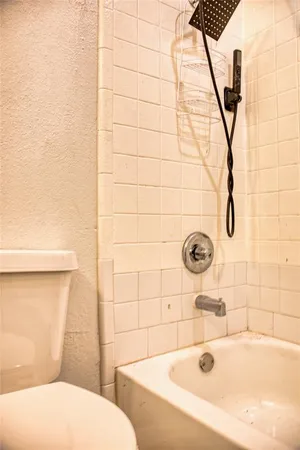 a bathroom with a sink and a shower