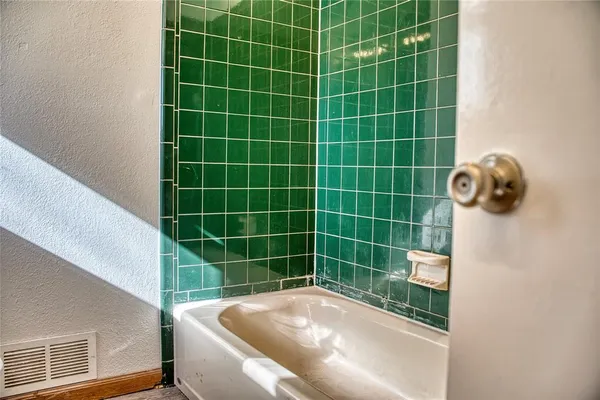 a view of a wooden floor and a sink