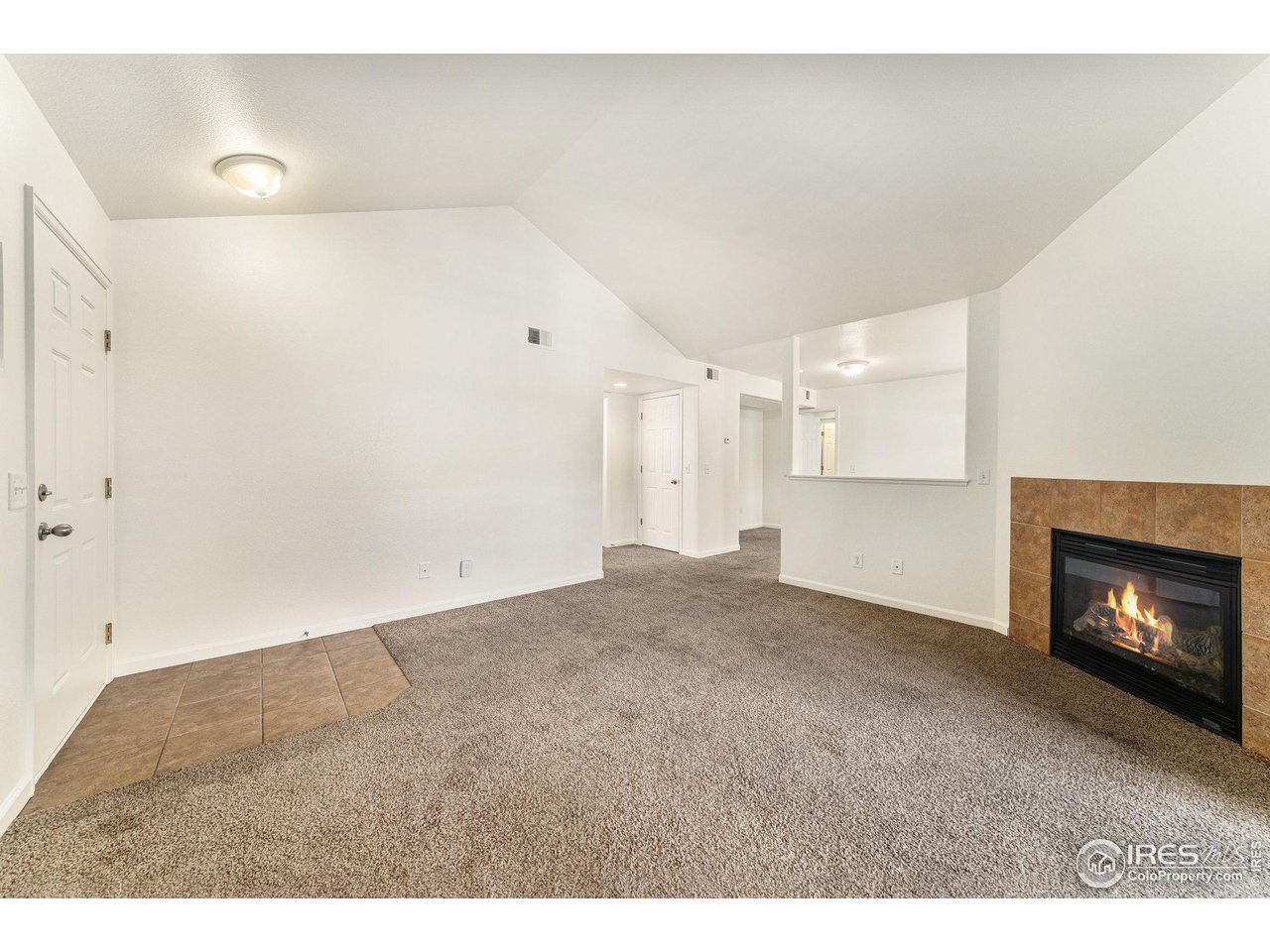 124 Beacon Way, Unit 3 Windsor, CO 80550 - Photo 4 of 22 a view of empty room