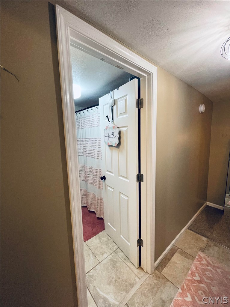 4982 Aitchison Road Onondaga, NY 13215 - Photo 8 of 26 lets take a peek at the main hall bath