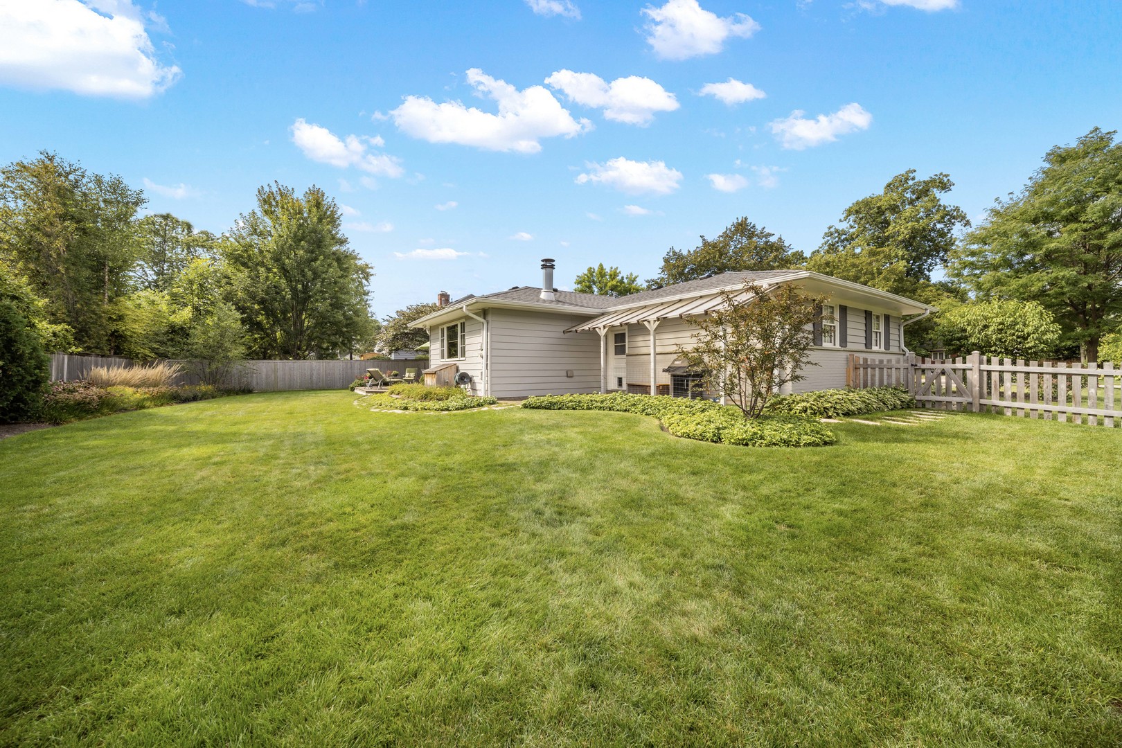275 Ingram Street Northfield, IL 60093 - Photo 25 of 29 a view of a house with a big yard