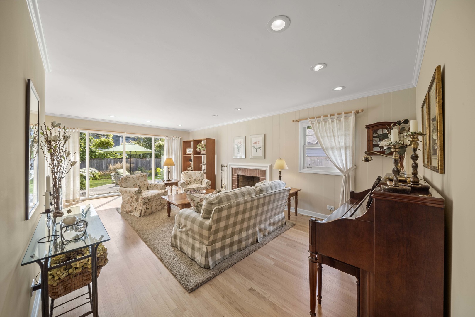 275 Ingram Street Northfield, IL 60093 - Photo 6 of 29 a living room with furniture and a flat screen tv