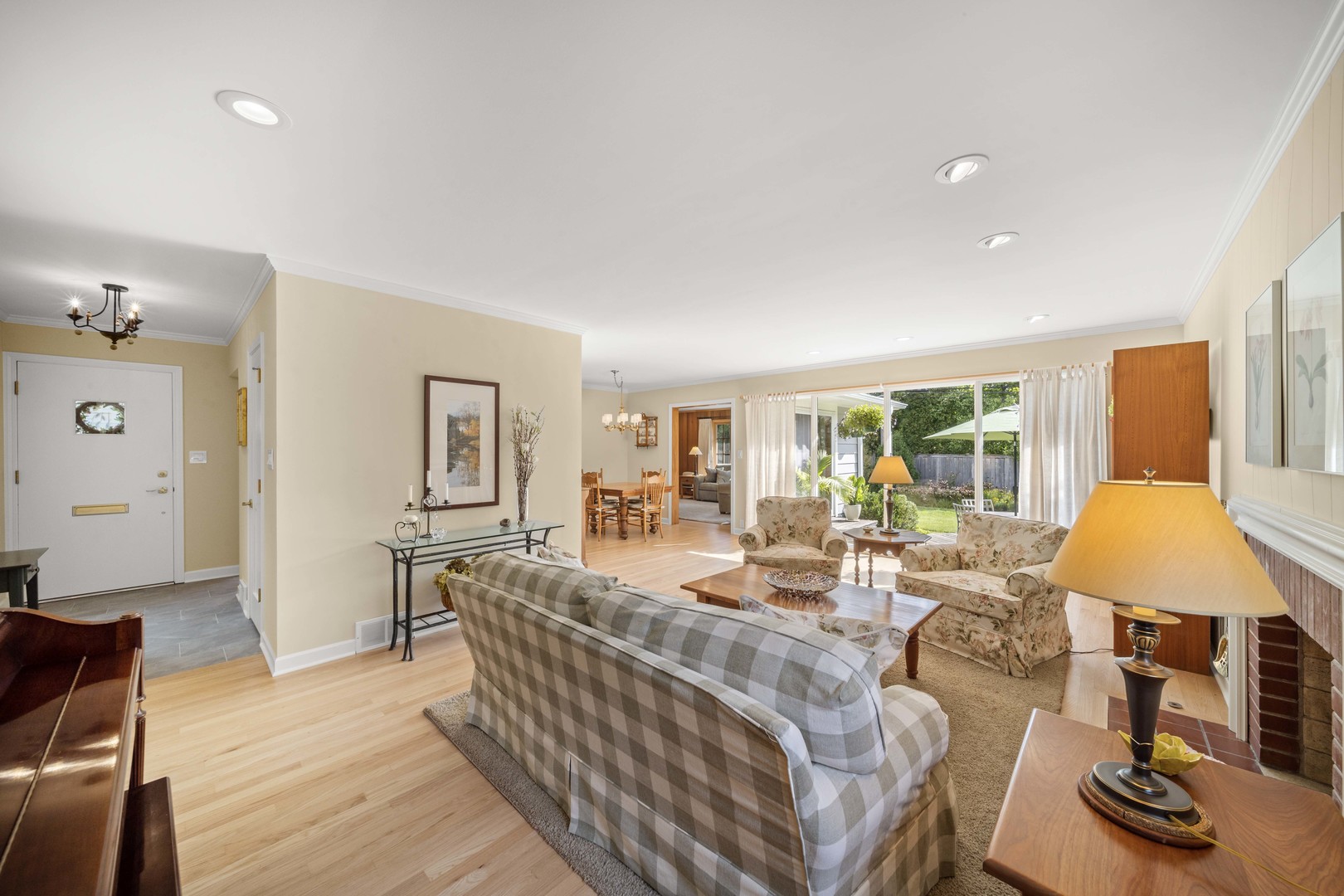 275 Ingram Street Northfield, IL 60093 - Photo 7 of 29 a living room with furniture and a table