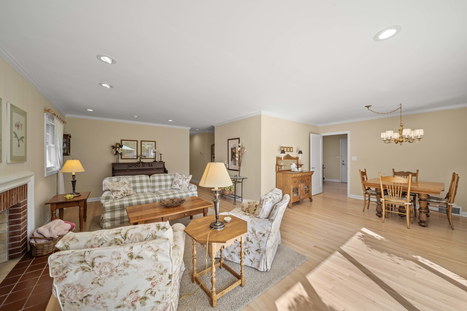 275 Ingram Street Northfield, IL 60093 - Photo 8 of 29 a living room with furniture a dining table and chairs with wooden floor