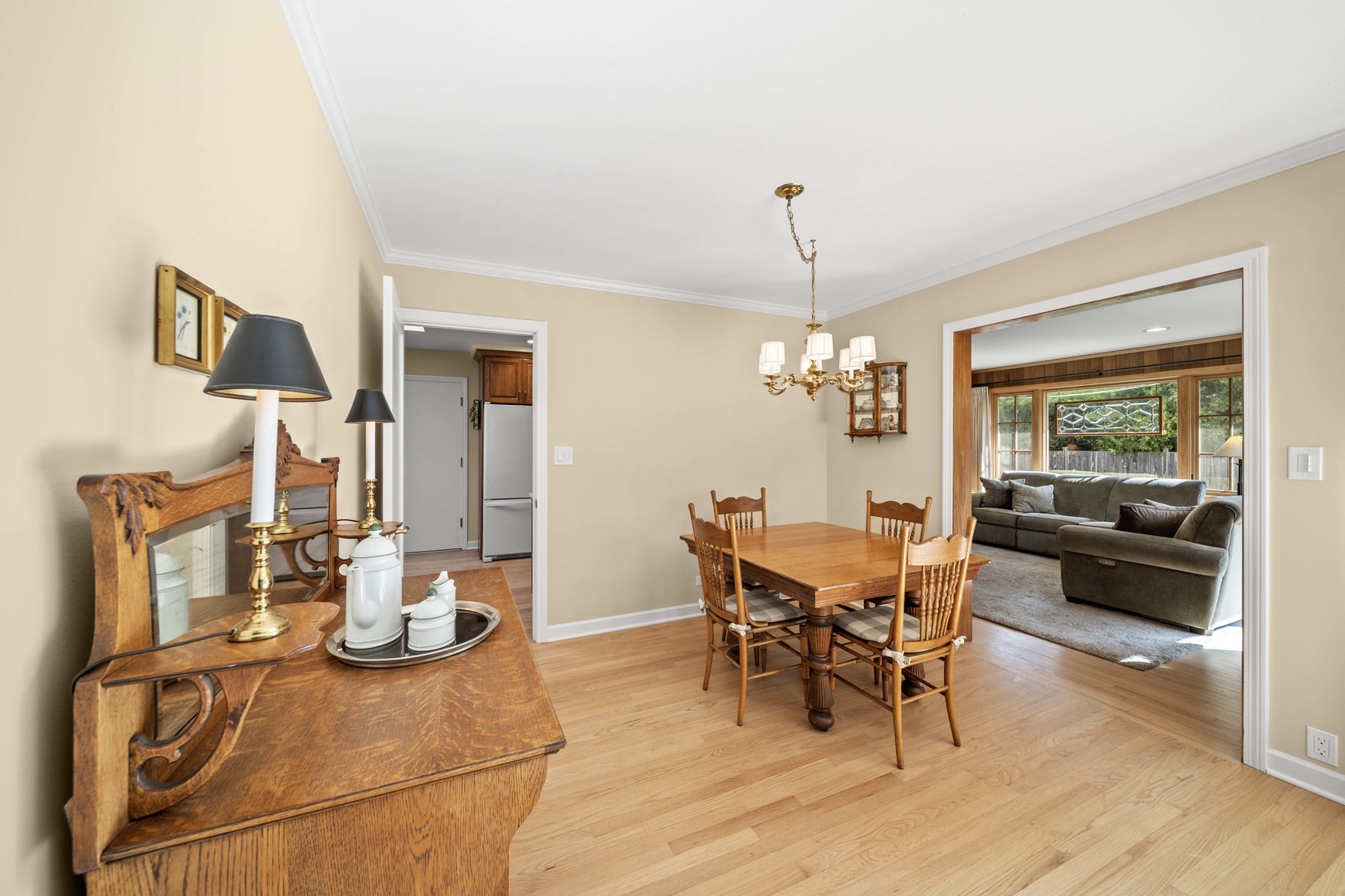 275 Ingram Street Northfield, IL 60093 - Photo 9 of 29 a view of a dining room with furniture and wooden floor