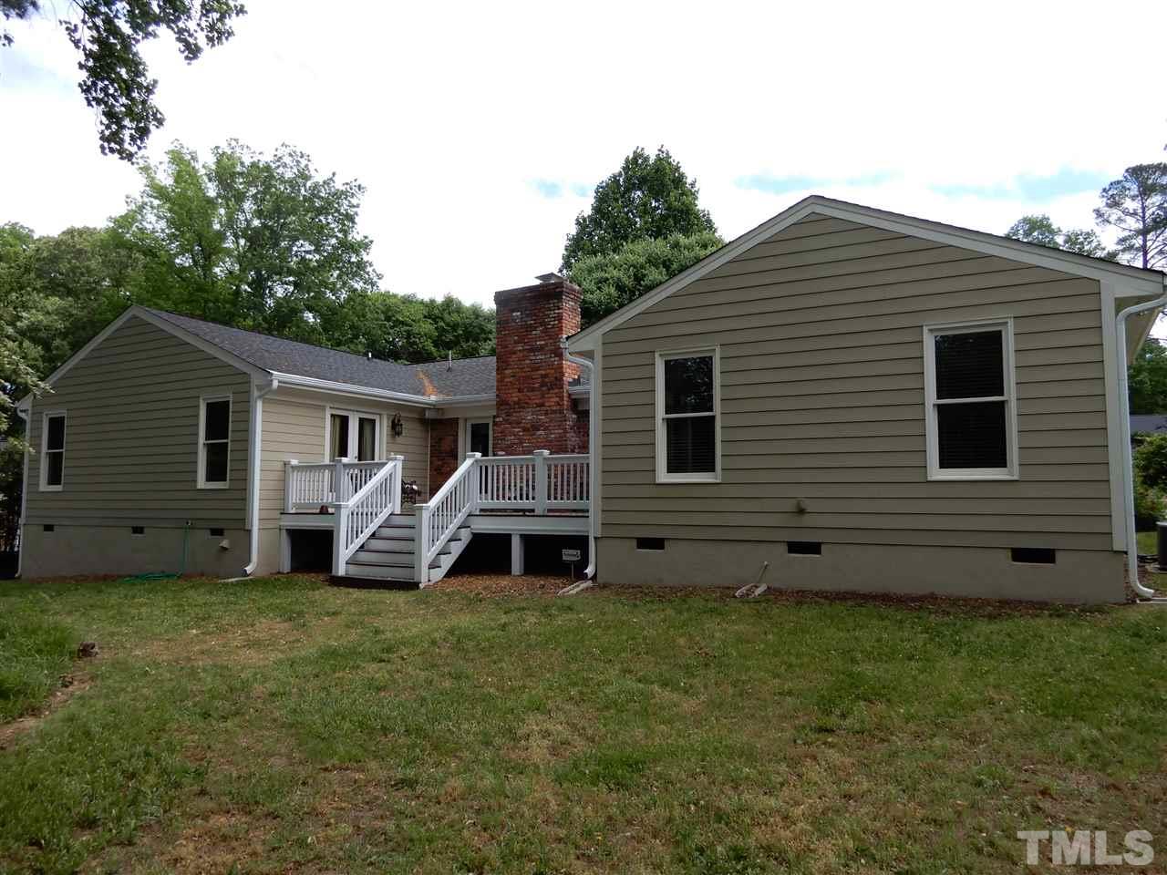 4605 Pitt Street Raleigh, NC 27609 - Photo 2 of 22 a view of a house with a yard and sitting area