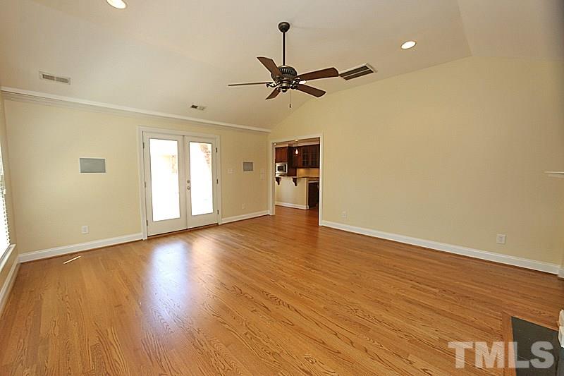 4605 Pitt Street Raleigh, NC 27609 - Photo 12 of 22 a view of empty room with wooden floor