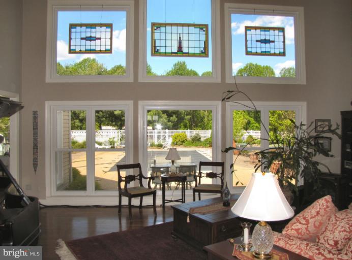 2208 Link Road Silver Spring, MD 20905 - Photo 11 of 30 a view of a dining room with furniture and a window