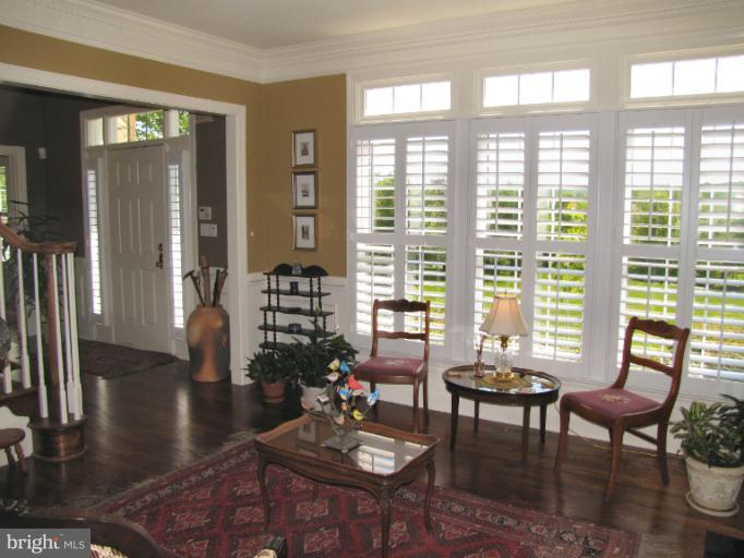 2208 Link Road Silver Spring, MD 20905 - Photo 17 of 30 a living room with furniture and a large window