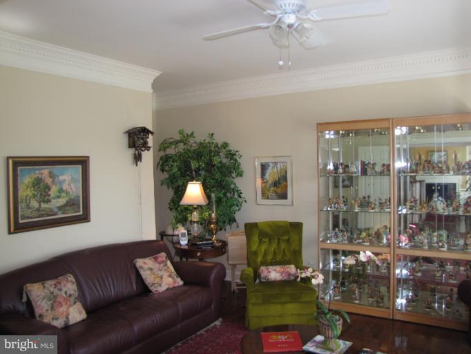 2208 Link Road Silver Spring, MD 20905 - Photo 25 of 30 a living room with furniture and a fireplace