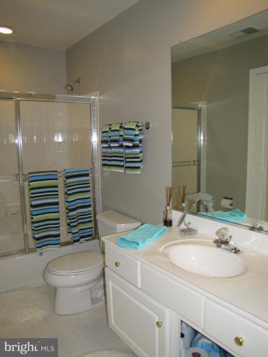 2208 Link Road Silver Spring, MD 20905 - Photo 27 of 30 a bathroom with a sink a toilet and shower