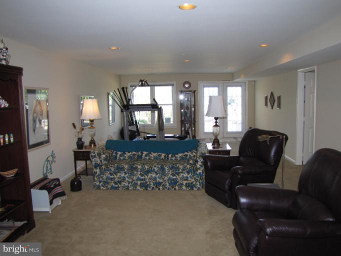 2208 Link Road Silver Spring, MD 20905 - Photo 3 of 30 a living room with furniture and a fireplace