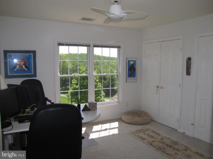 2208 Link Road Silver Spring, MD 20905 - Photo 4 of 30 a living room with furniture and a window
