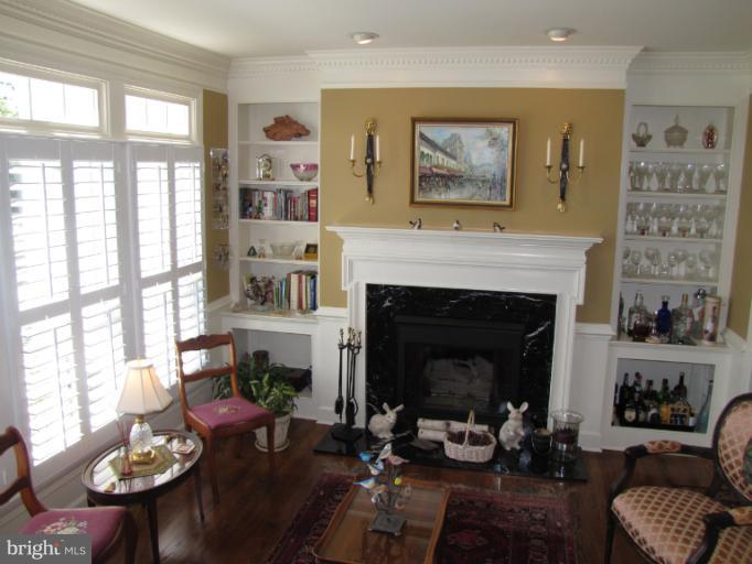 2208 Link Road Silver Spring, MD 20905 - Photo 7 of 30 a living room with furniture and a fireplace