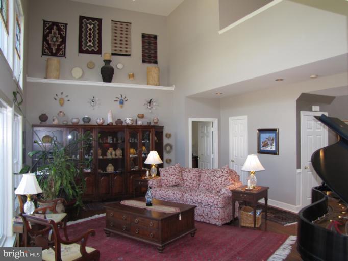 2208 Link Road Silver Spring, MD 20905 - Photo 8 of 30 a living room with furniture and wooden floor